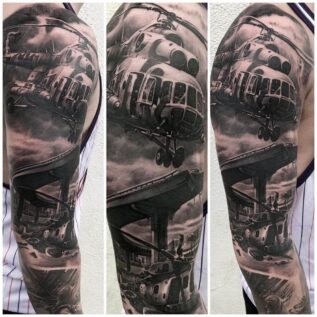 black-and-grey-war-themed-sleeve-tattoo